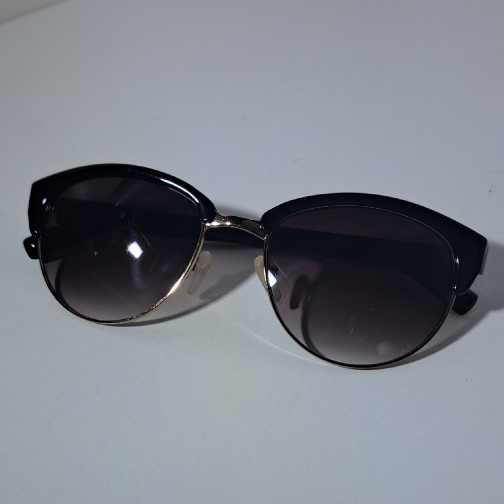 Oscar De La Renta Sunglasses.